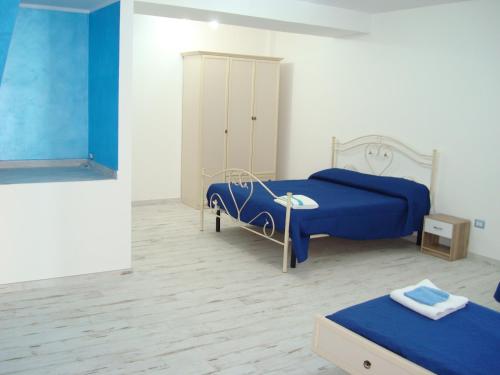 Postel nebo postele na pokoji v ubytování Guest House Mare e Luna