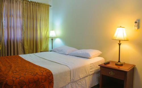 Katil atau katil-katil dalam bilik di Hotel Fontana