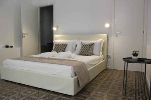 Posteľ alebo postele v izbe v ubytovaní Dimora di Eracle