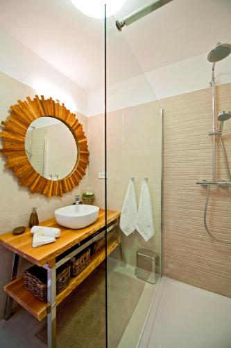 a bathroom with a sink and a mirror at Luxury Apartment Dvor in Split
