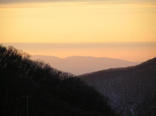 a view of a mountain range at sunset at Falls Creek Country Club in Falls Creek