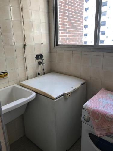 Ванна кімната в Apartamento Pitangueiras