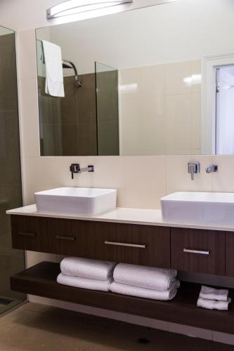 Bilik mandi di Simmers Serviced Apartments