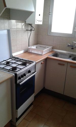 Kuchyň nebo kuchyňský kout v ubytování Apartamentos Mediterranean View