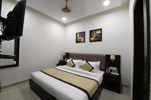Katil atau katil-katil dalam bilik di Madhav Muskan Residency