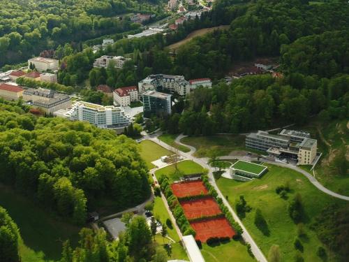 an aerial view of a city with trees and buildings at Atlantida Boutique Hotel in Rogaška Slatina