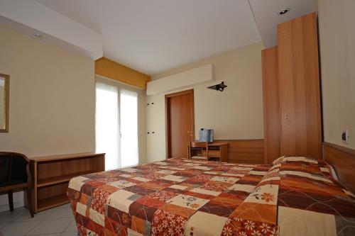 Hotel Al Ragnoにあるベッド
