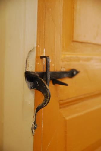 a pair of scissors sticking out of a door at Hotel Sven Vintappare in Stockholm
