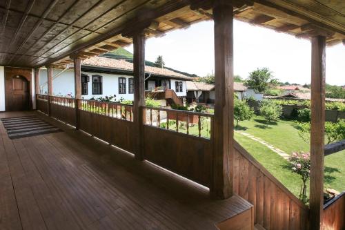 an outdoor deck with a view of a house at Osmarski Houses in Osmar
