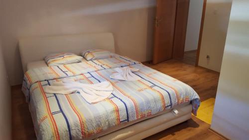 Postel nebo postele na pokoji v ubytování Sephora House
