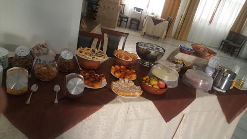 a table with a bunch of food on it at Hotel Ristorante Antica Marina in Nicotera Marina