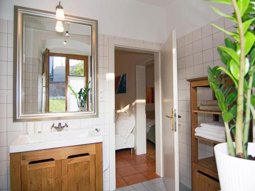 a bathroom with a sink and a mirror at Ferienwohnung Mariazell in Mariazell