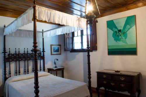 Ένα ή περισσότερα κρεβάτια σε δωμάτιο στο Casa de Pascoaes Historical House