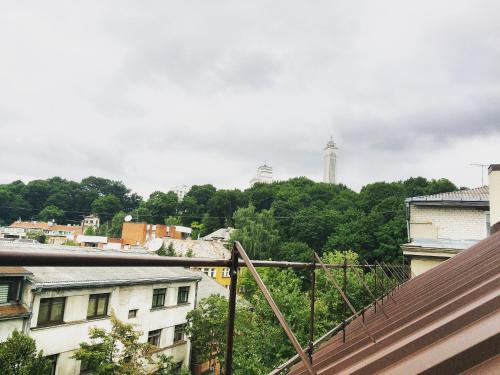 a view of a city with buildings and trees at Jolando Apartment in Kaunas