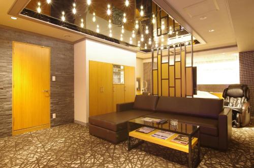 Χώρος καθιστικού στο BlueHotel sju(:)pri:m (Adult Only)