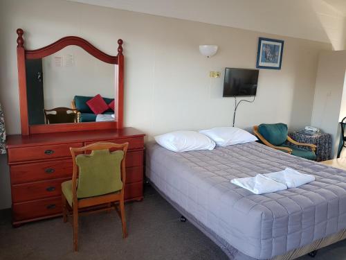 Cama o camas de una habitación en Manhattan Motel