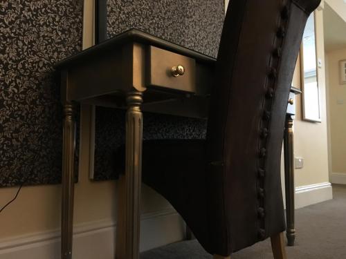 a close up of a bed in a room at Ellan Vannin Hotel in Douglas