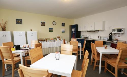 Kuchyň nebo kuchyňský kout v ubytování Hotel Schillerquartier