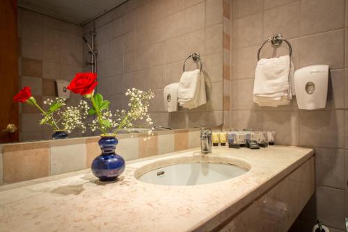 A bathroom at Mary’s Well Nazareth By Dan Hotels