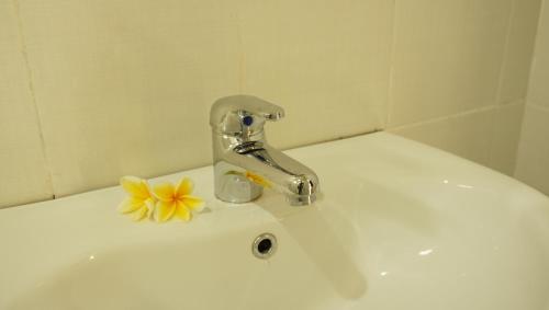 Ένα μπάνιο στο Lala Home Stay