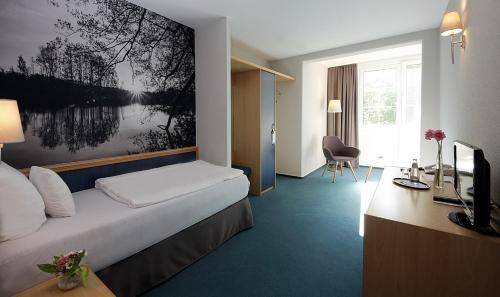 Hotel Haus Chorinにあるベッド