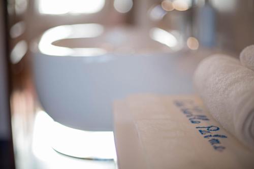 a close up of a piece of paper on a table at Ca' delle palme in Martellago