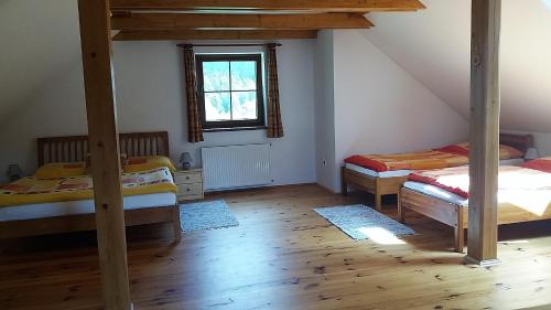 Llit o llits en una habitació de Horní Planá