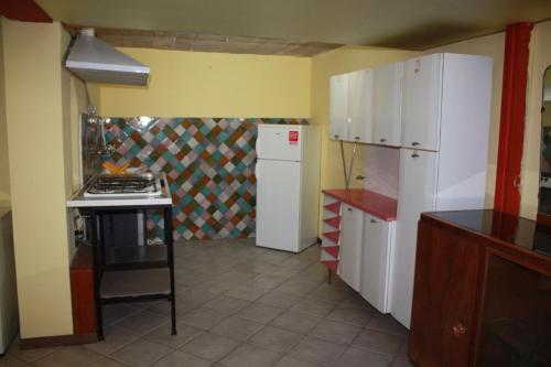 Cuisine ou kitchenette dans l'établissement Appartamento Con Cortile