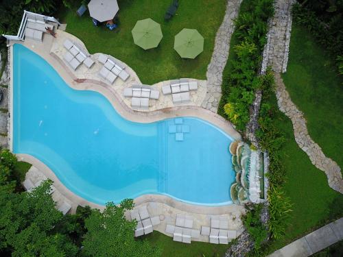 Hotel La Aldea del Halach Huinicの敷地内または近くにあるプール