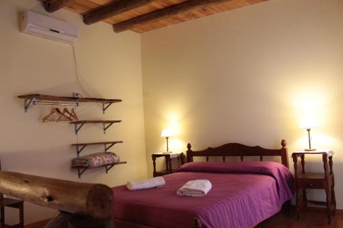 Posteľ alebo postele v izbe v ubytovaní Cabañas La Barranquita