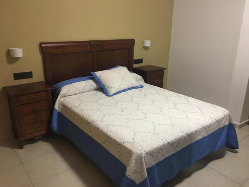 Cama o camas de una habitación en Hotel La Parra