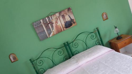 Postel nebo postele na pokoji v ubytování Bed and Breakfast Arcobaleno