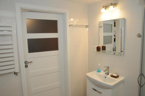 Ванна кімната в Apartamenty Kamienica