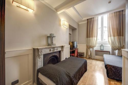 Posteľ alebo postele v izbe v ubytovaní 939 Hotel