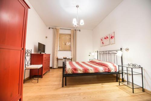 Una cama o camas en una habitación de Bernardone