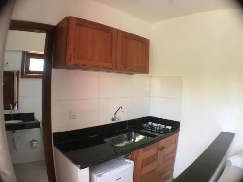 A kitchen or kitchenette at Arpoador Flat