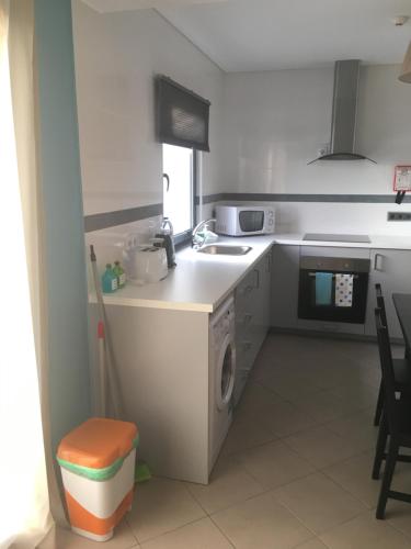 Η κουζίνα ή μικρή κουζίνα στο Apartamentos Basalto