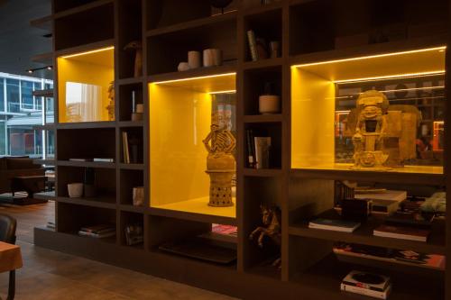 a book shelf with a fire hydrant in it at Hyatt Centric Guatemala City in Guatemala