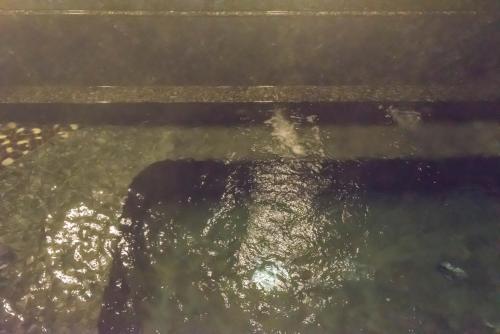 a close up of the water in a tank at Awara Grand Hotel in Awara