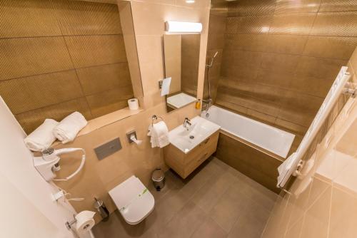 Ένα μπάνιο στο UBA Accommodation Aparthotel