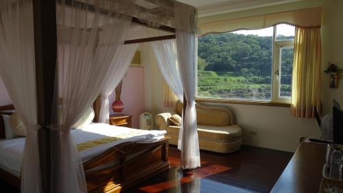 Postel nebo postele na pokoji v ubytování Emoonten Homestay