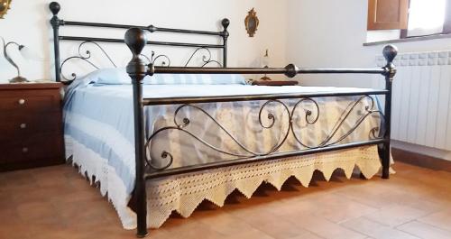 Postel nebo postele na pokoji v ubytování Casa dei Borghi