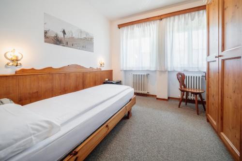 Postel nebo postele na pokoji v ubytování Hotel Al Larin