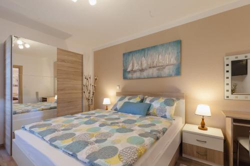 Postel nebo postele na pokoji v ubytování IRIS Room & Apartment