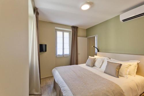 Posteľ alebo postele v izbe v ubytovaní Residence Pidrinella