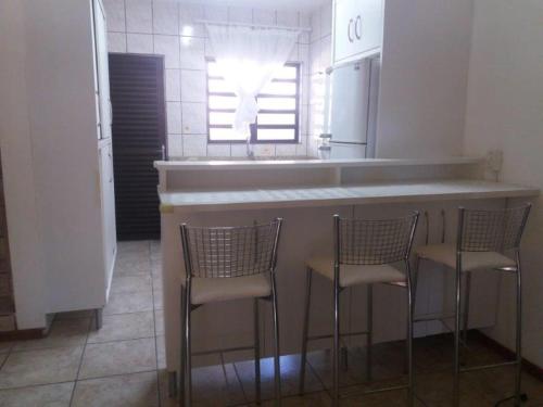 A kitchen or kitchenette at Residencial Mailai
