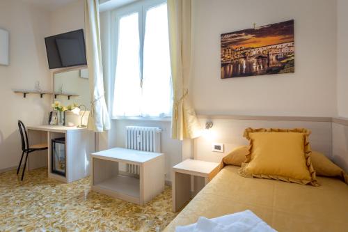 Ένα ή περισσότερα κρεβάτια σε δωμάτιο στο B&B Dolce Luna
