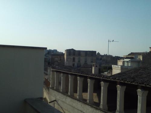 a view of a city from the roof of a building at Sister's love in Matera