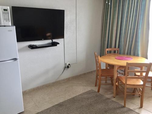 TV a/nebo společenská místnost v ubytování Lollipop Motel