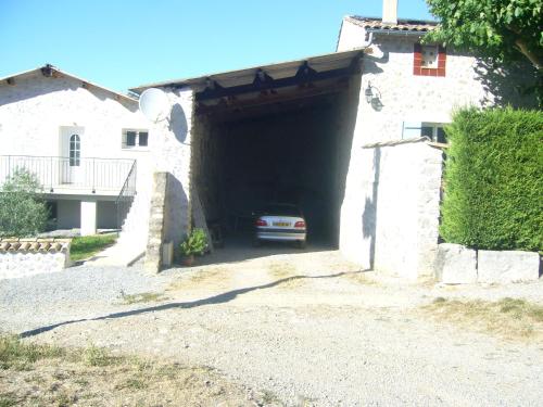 a car is driving through a tunnel at Maison de Campagne aux deux Oliviers in Val Buëch-Méouge